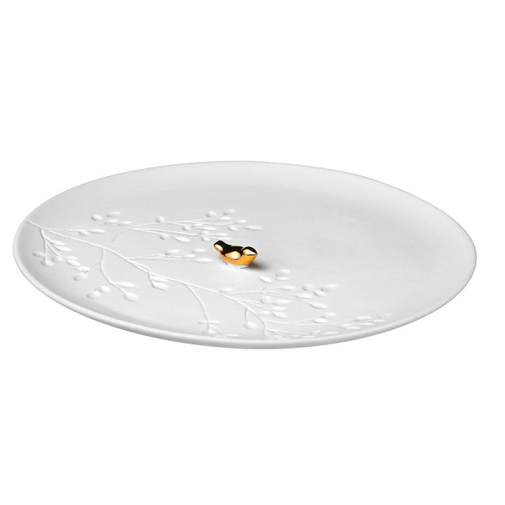 Porcelāna dekoratīvais šķīvītis ar zelta putniņu